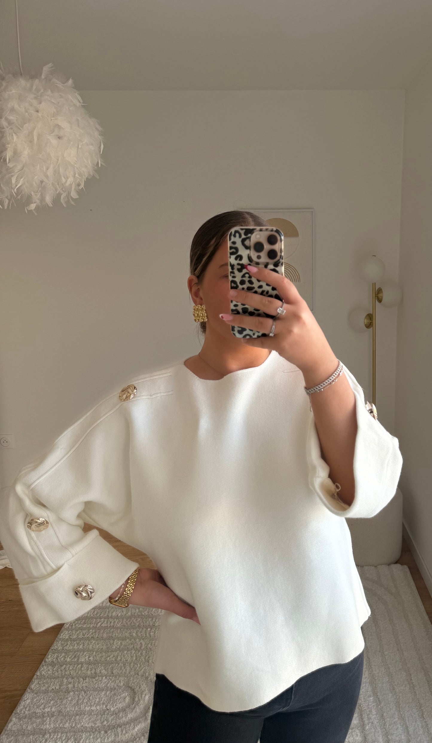 Pull blanc manche bouton