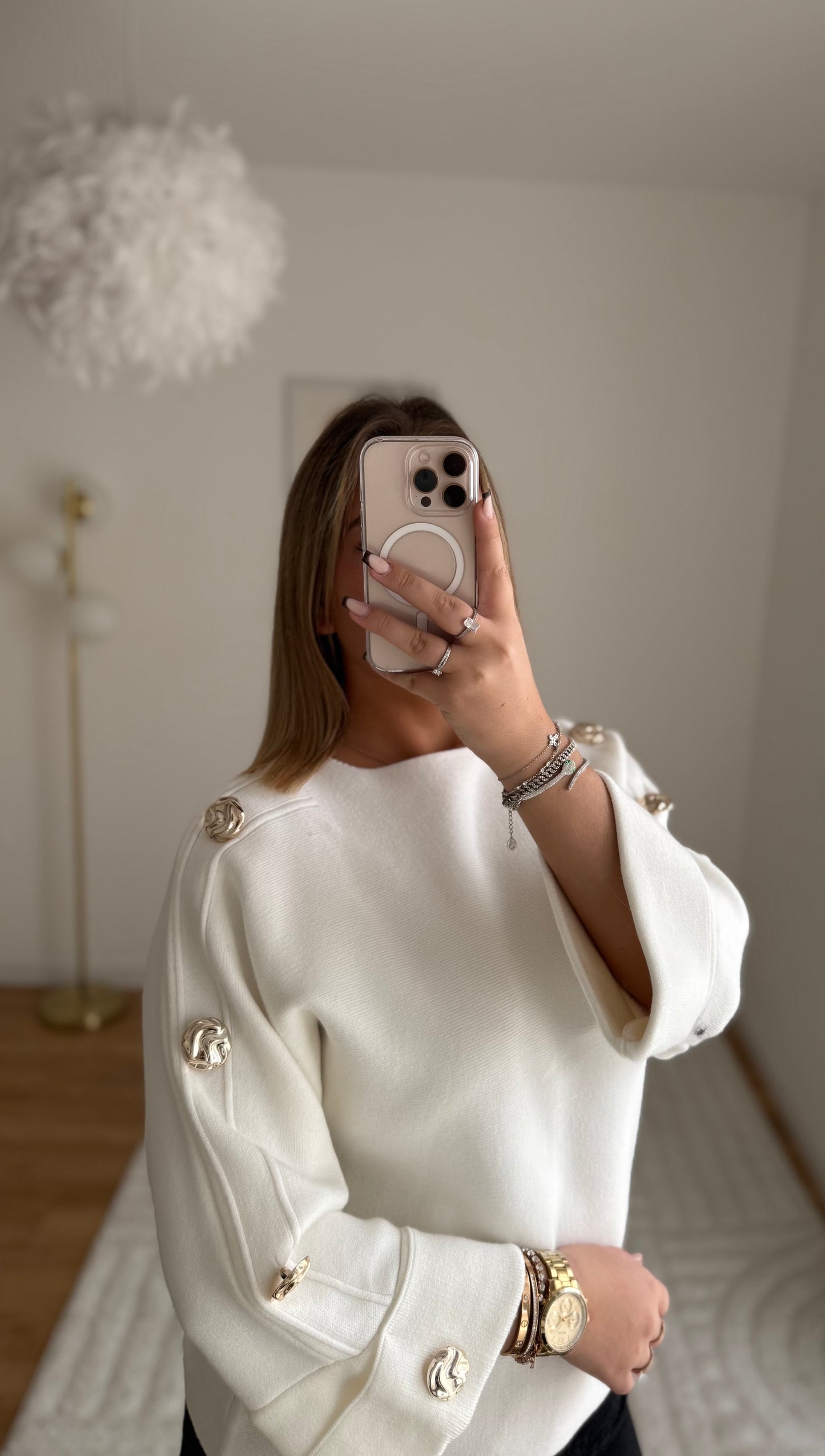 Pull blanc manche bouton