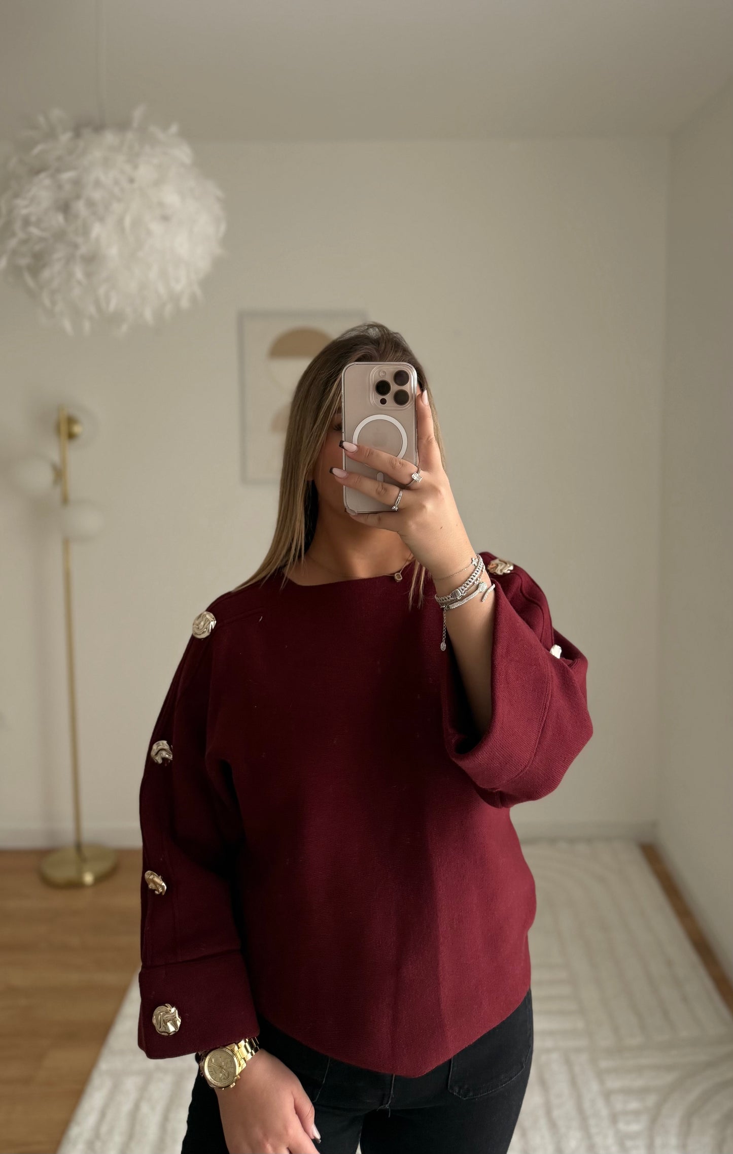Pull bordeaux manche bouton