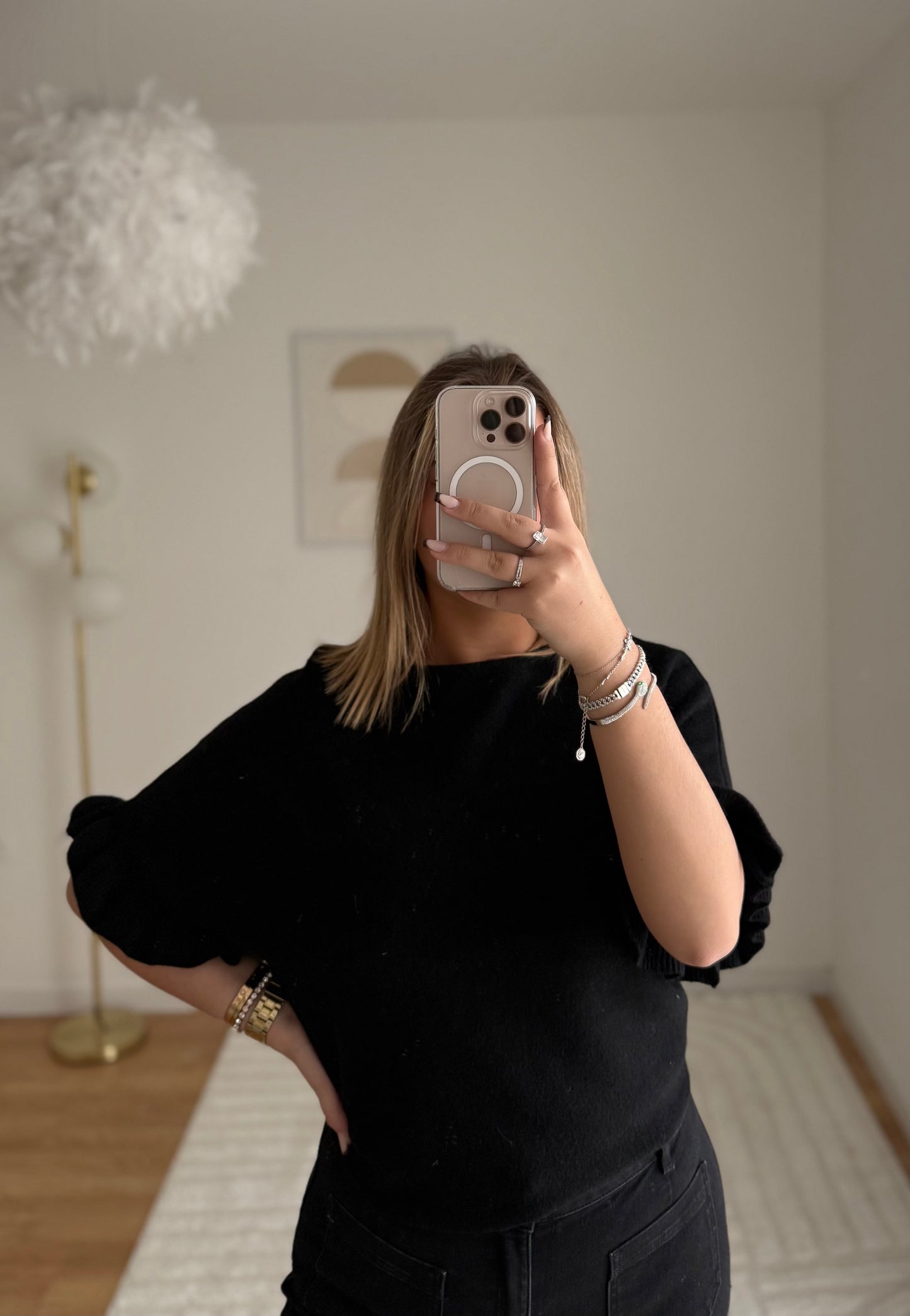 Pull froufrou noir