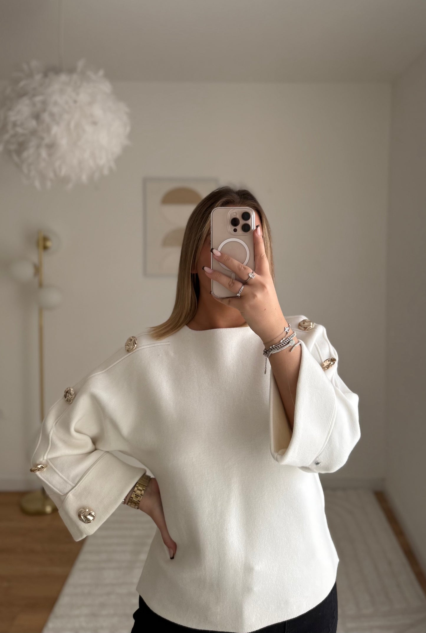 Pull blanc manche bouton